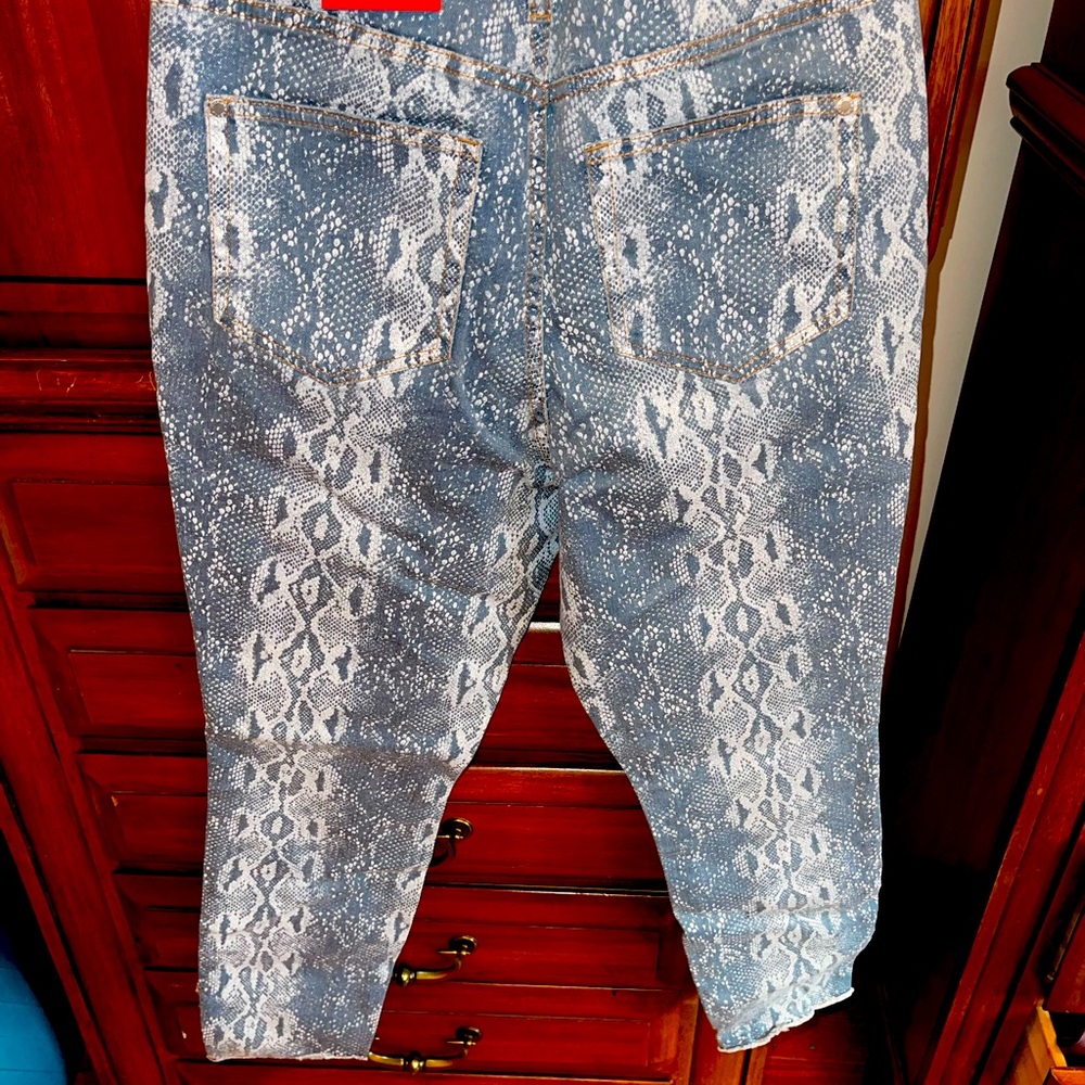 Jennifer Lopez snake print jeans